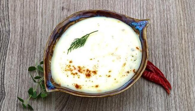 Cheese soup with chicken for lunch on a low-carb diet menu